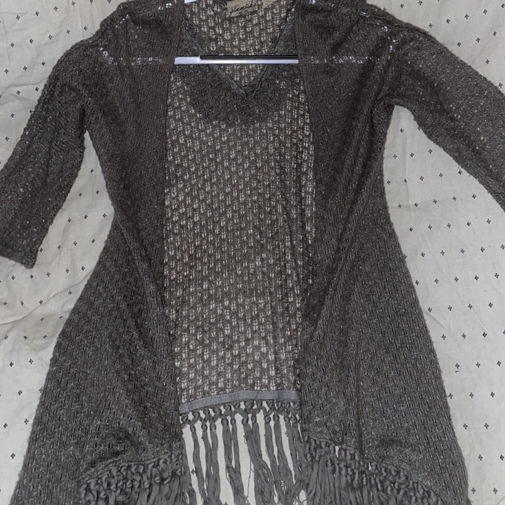 $10 Buckle fringe sweater. Size: xs